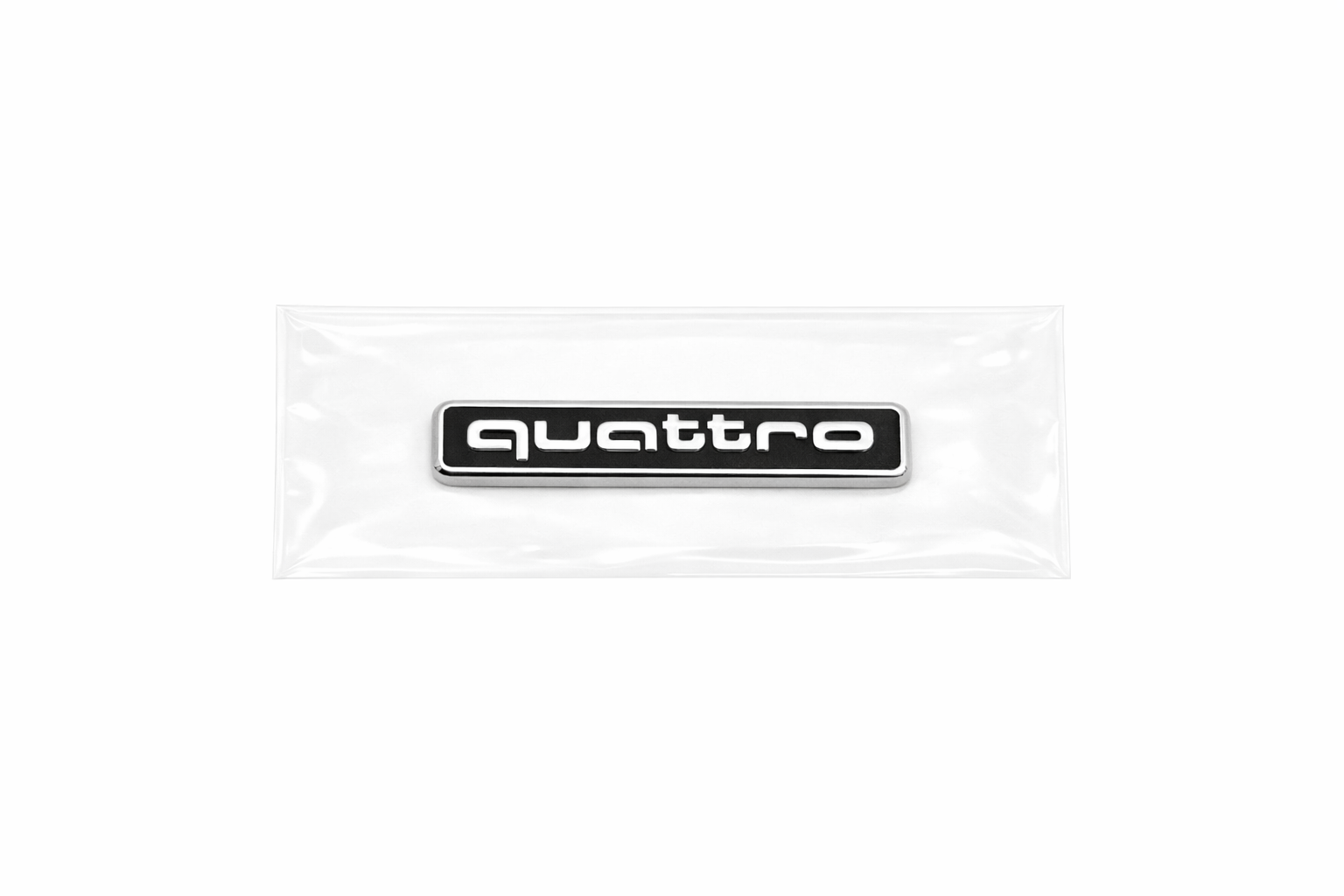 Audi Quattro logo achterzijde origineel 